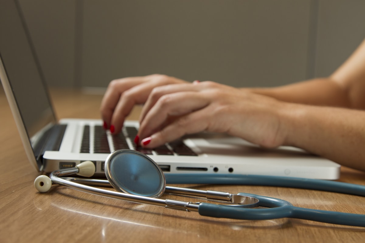 Healthcare professional reviewing information with a patient